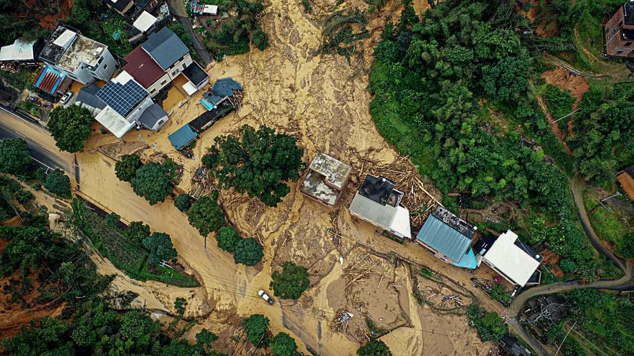 Four dead and over a dozen missing as extreme weather hits China