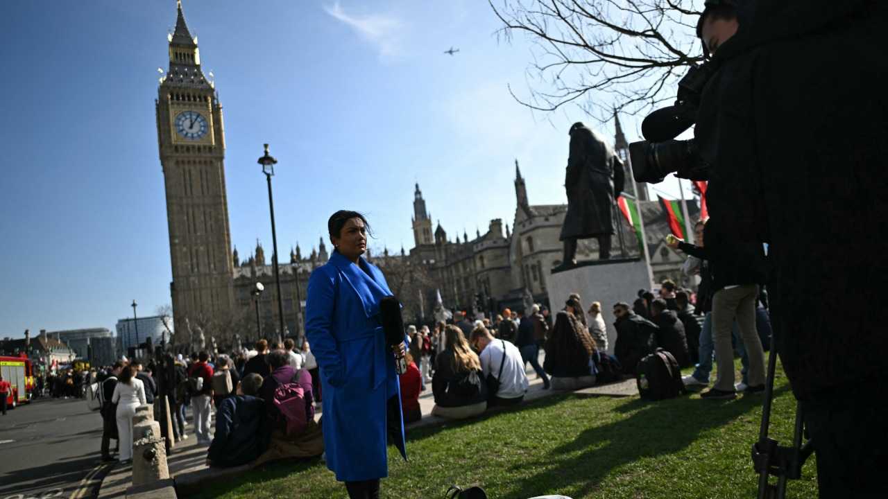 UK police close area around Big Ben as man with Palestinian flag scales tower